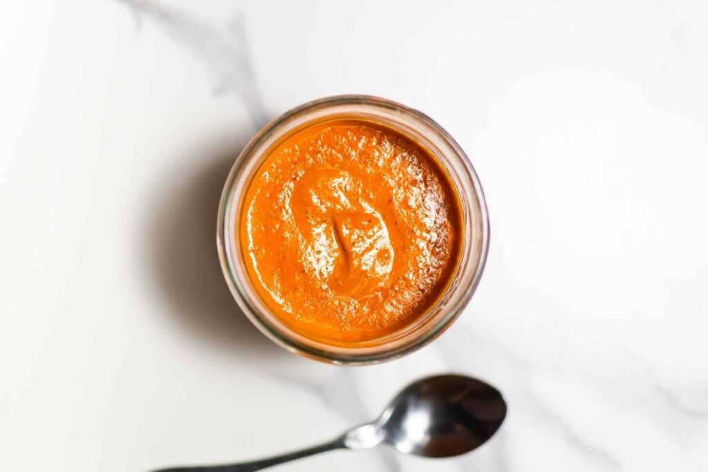A jar of buffalo sauce.