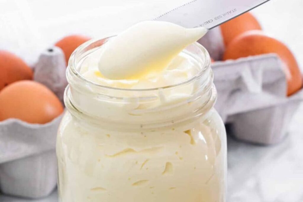 A jar of creamy homemade mayo.