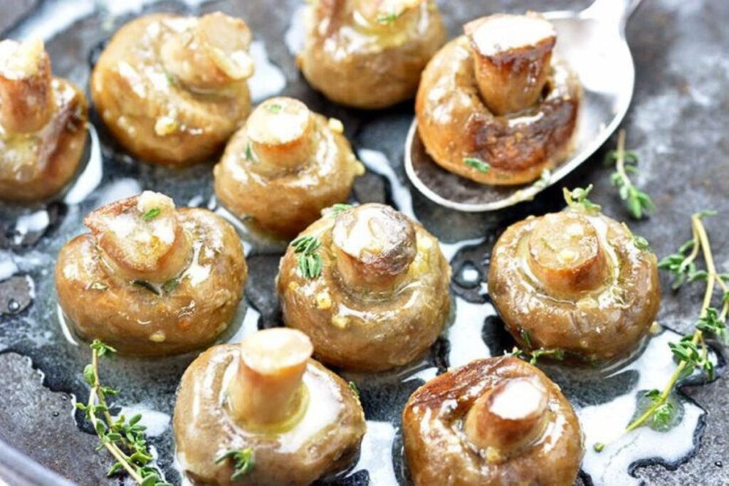 Roasted mushrooms in a pan.