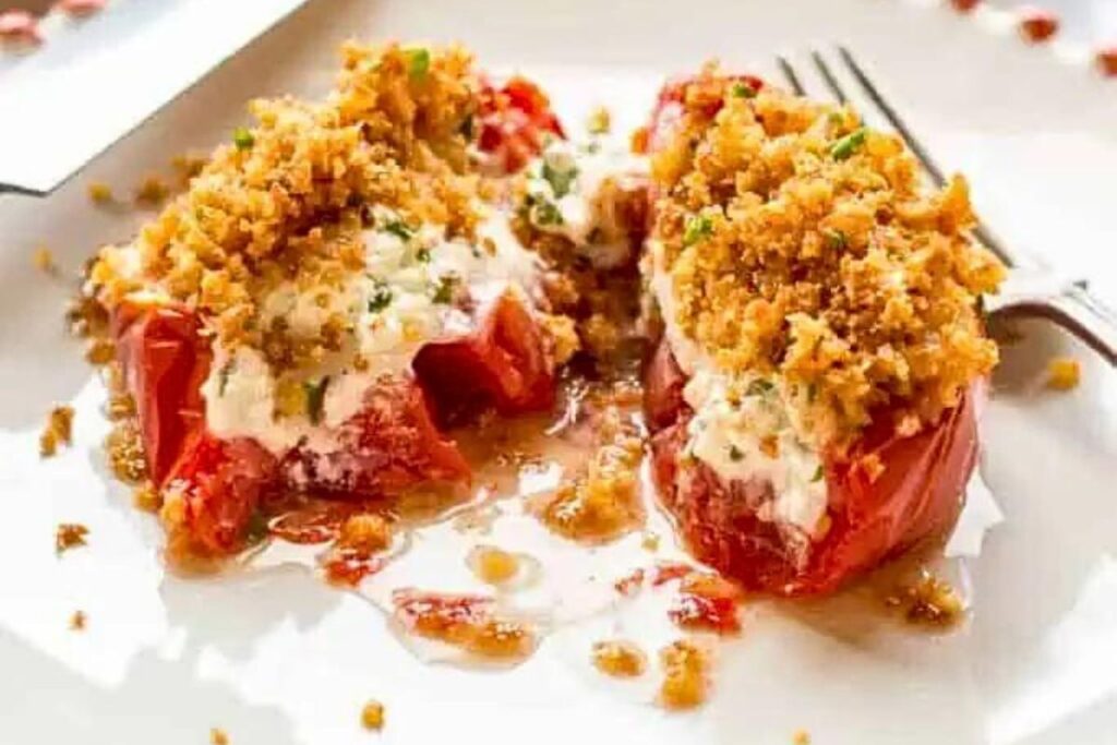 Goat cheese stuffed tomatoes, baked to perfection.