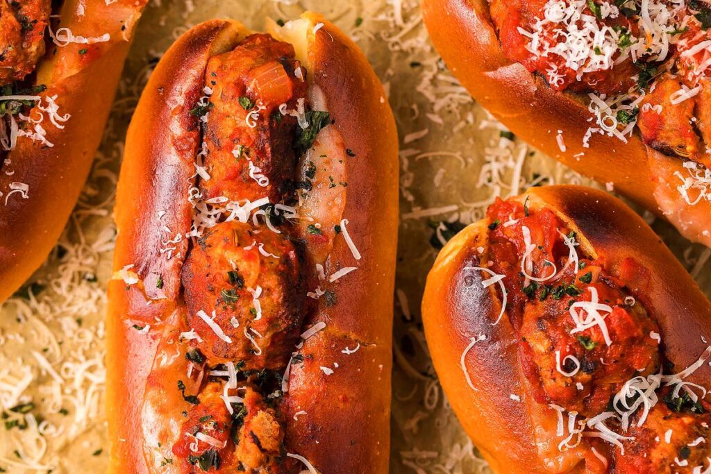 Meatball subs on a tray.