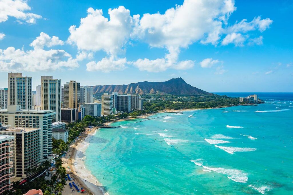 Waikiki Beach and Diamond Head Crater including the hotels and buildings in Waikiki, Honolulu, Oahu island, Hawaii. 