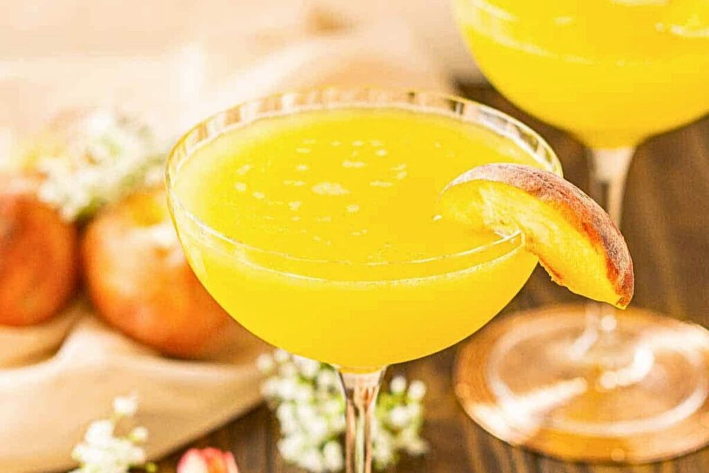 Glasses of fresh peach martinis.