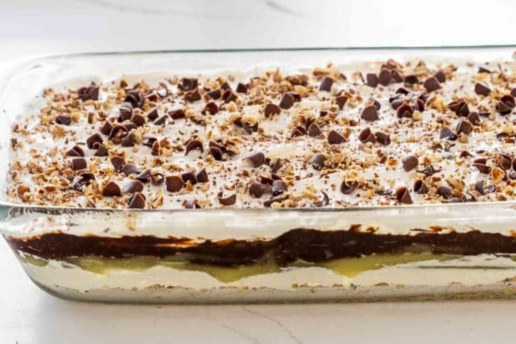 A pan of pudding and pecan dessert bars.