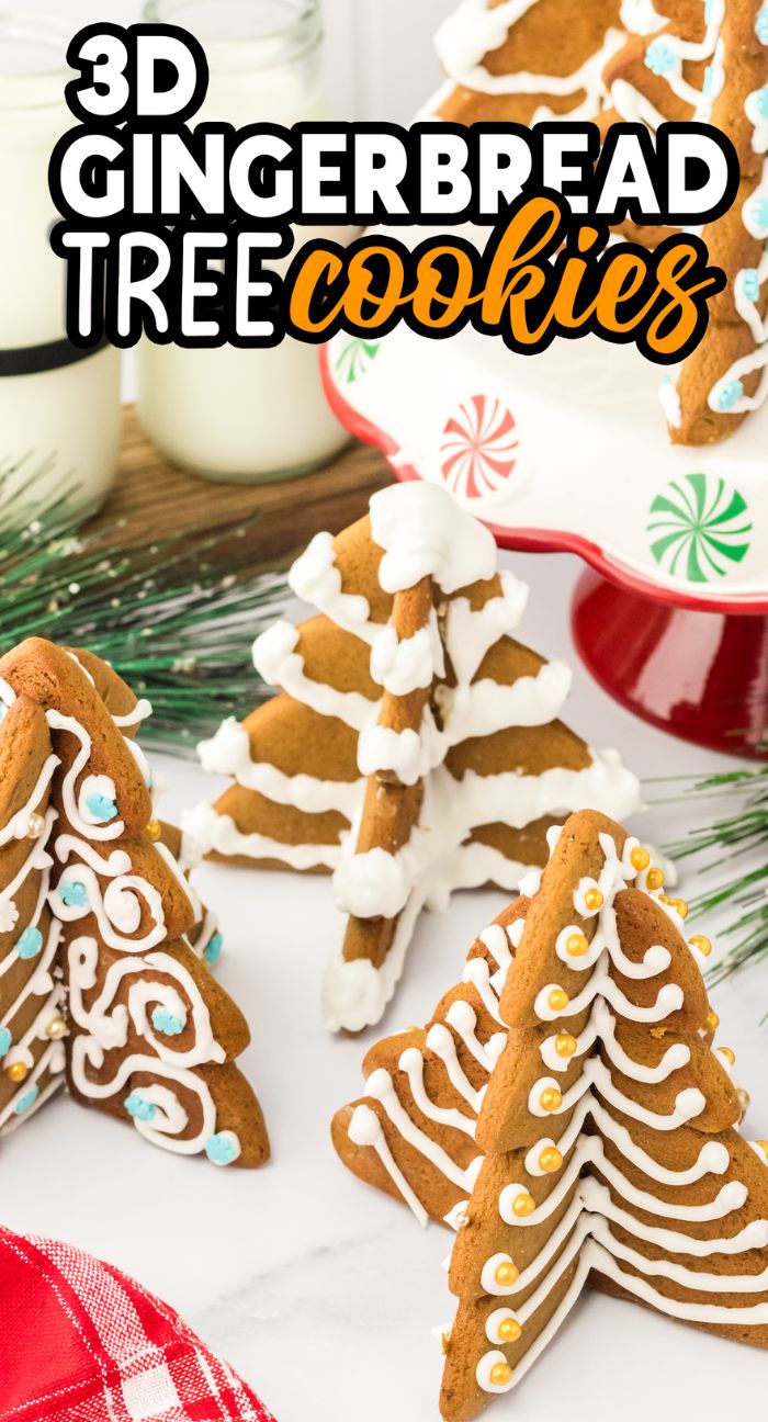 Decorated 3D Gingerbread Tree Cookies with white icing are displayed near milk and festive holiday decor, creating a charming seasonal scene.