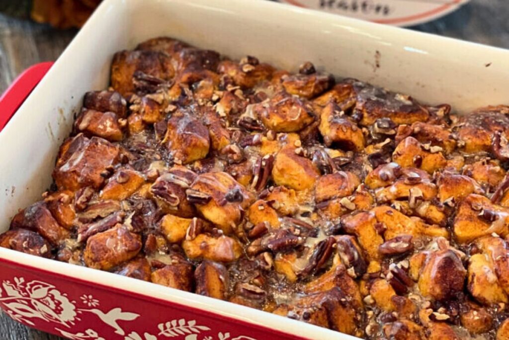 A casserole of cinnamon rolls and pumpkin with nuts.