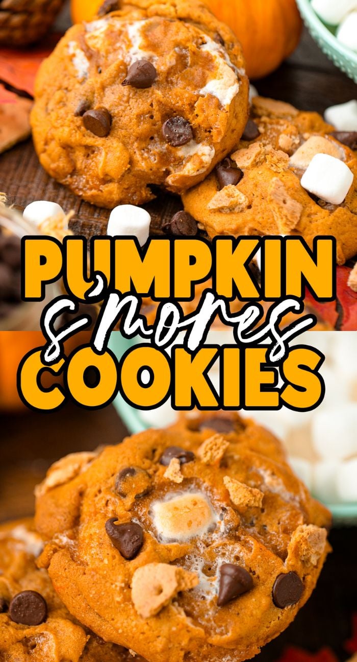 Pumpkin s'mores cookies filled with chocolate chips, marshmallows, and graham cracker pieces rest on a wooden table.
