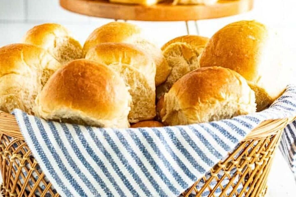 A basket of applesauce wheat dinner rolls.