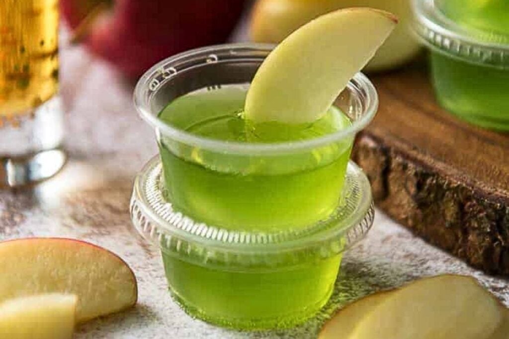 Green apple jello shots made with fireball.