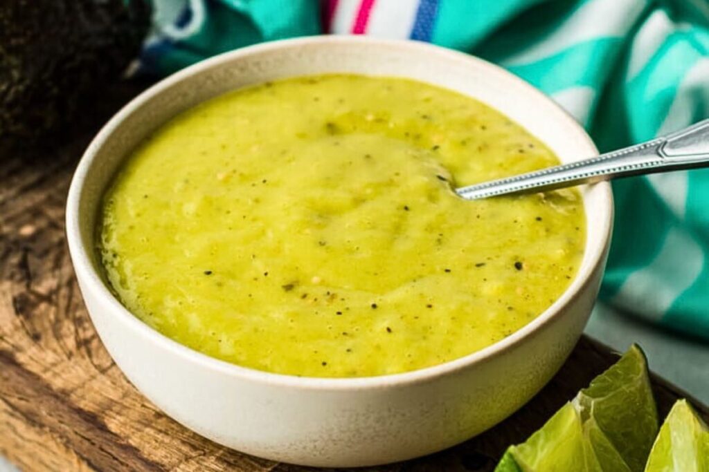 A dish of creamy avocado and tomatillo salsa.