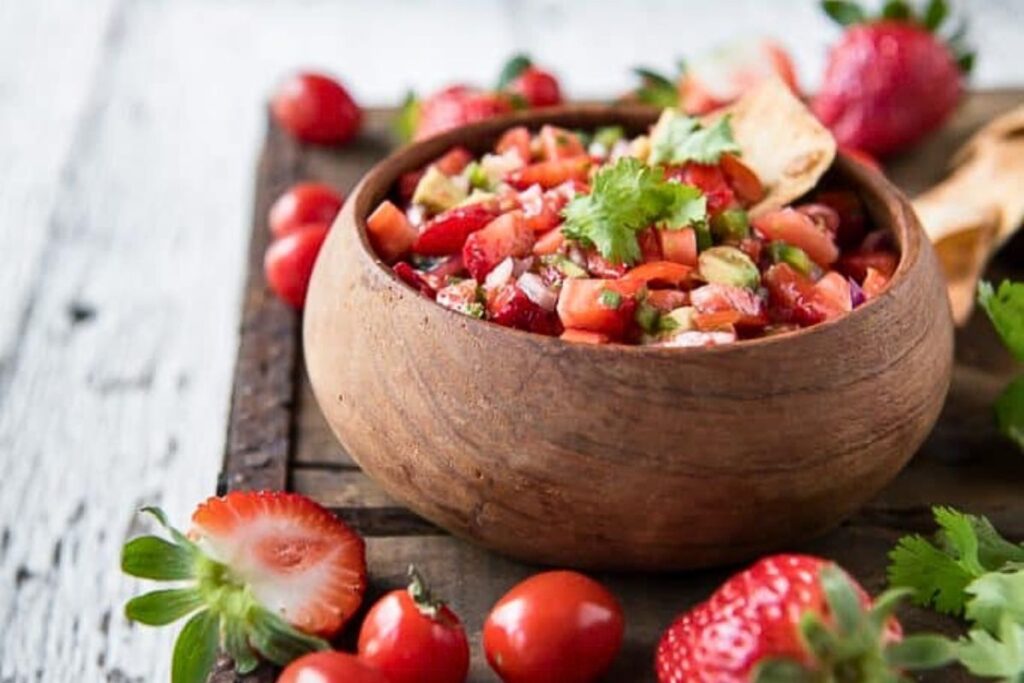 A bowl of fresh strawberry salsa.