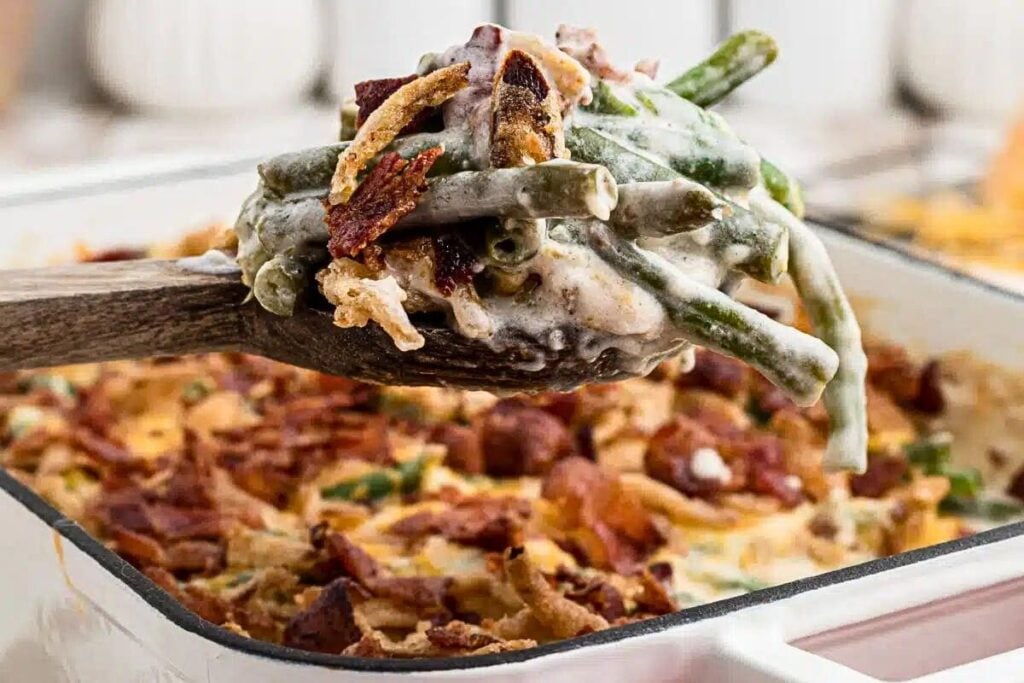 A scoop of loaded green bean casserole.