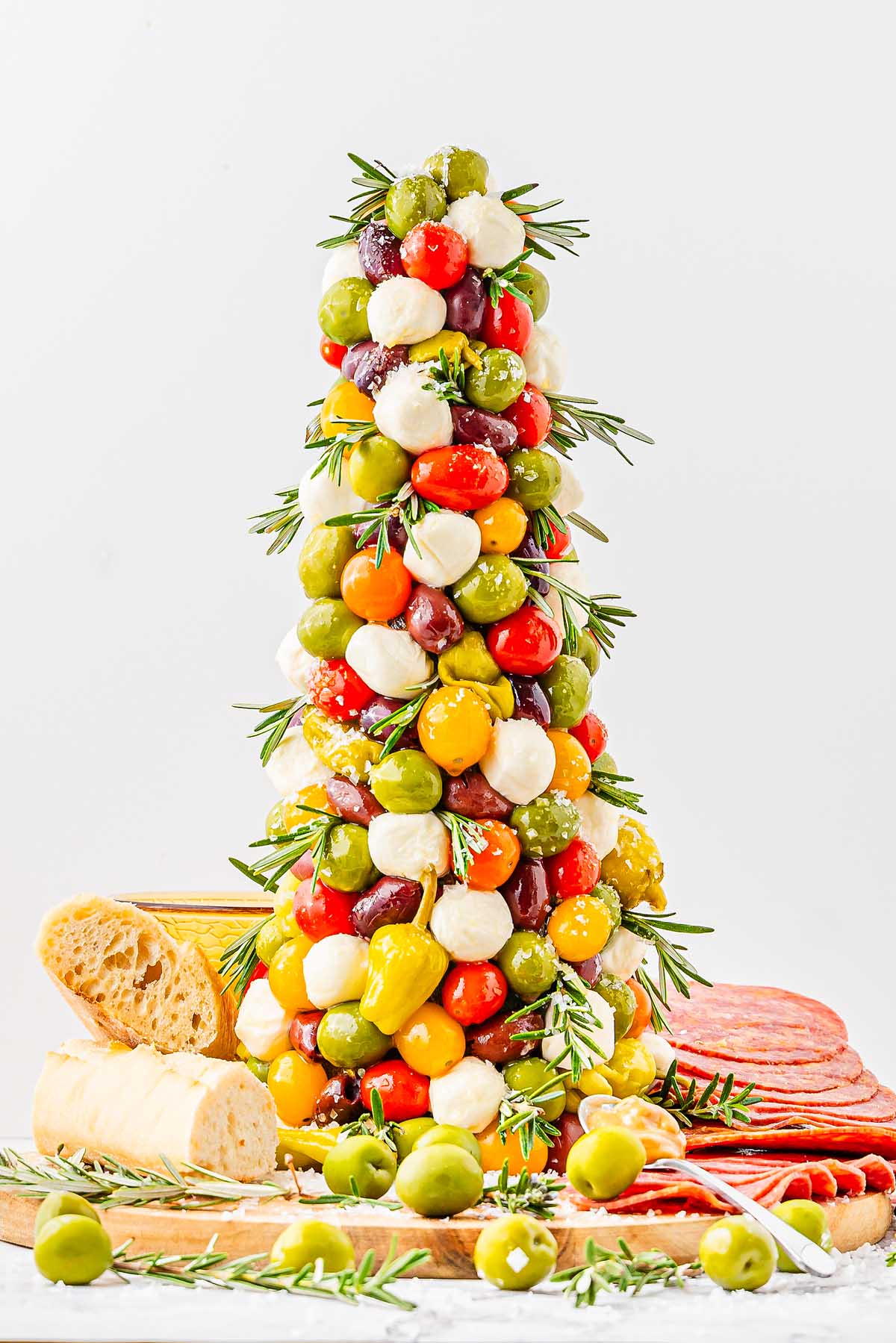An appetizer tree made with Italian antipasto ingredients.