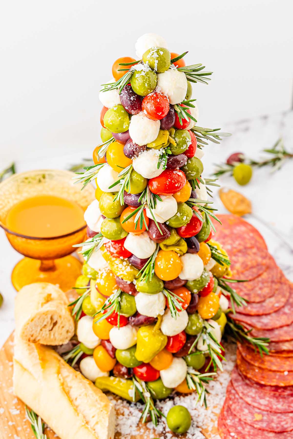 An antipasto Christmas tree on a table for the holidays.