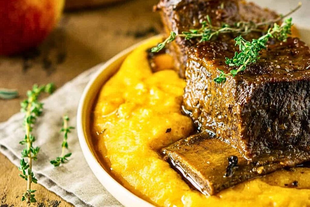 Short ribs served over polenta.