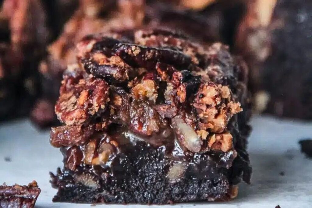 A gooey brownie with pecan pie toppings.