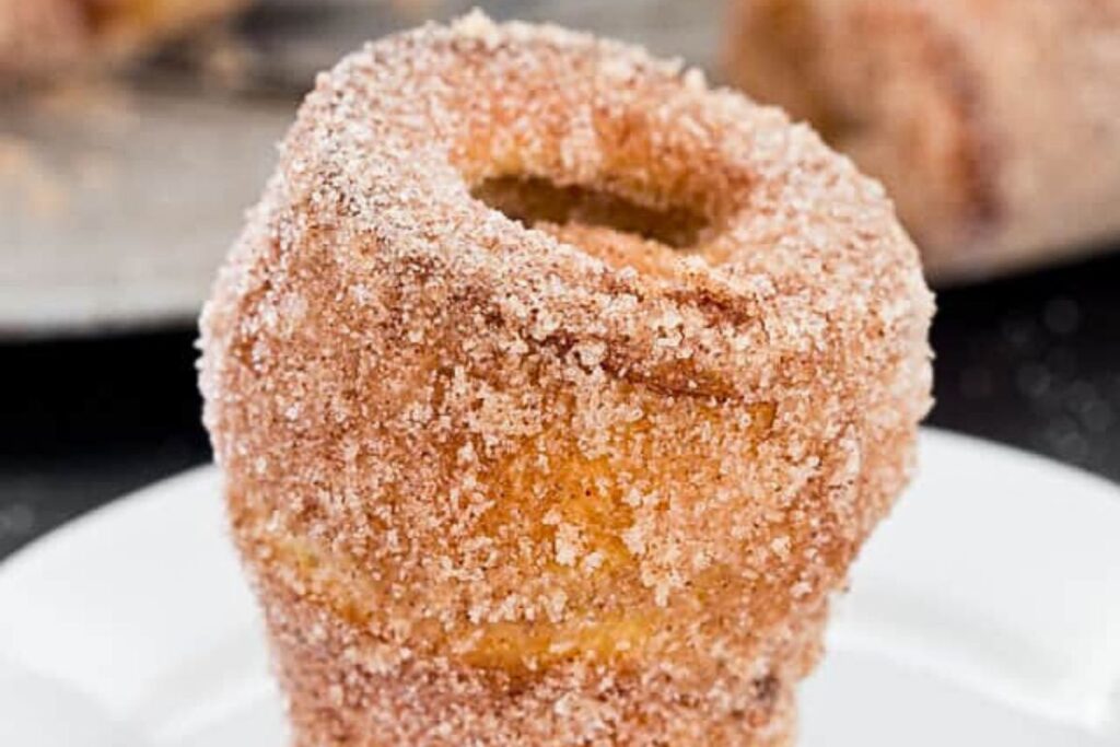Popovers coated in cinnamon and sugar.