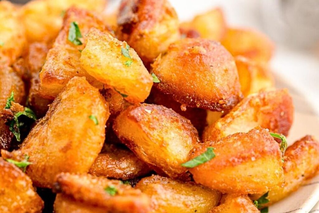 A dish of crispy roasted potatoes.
