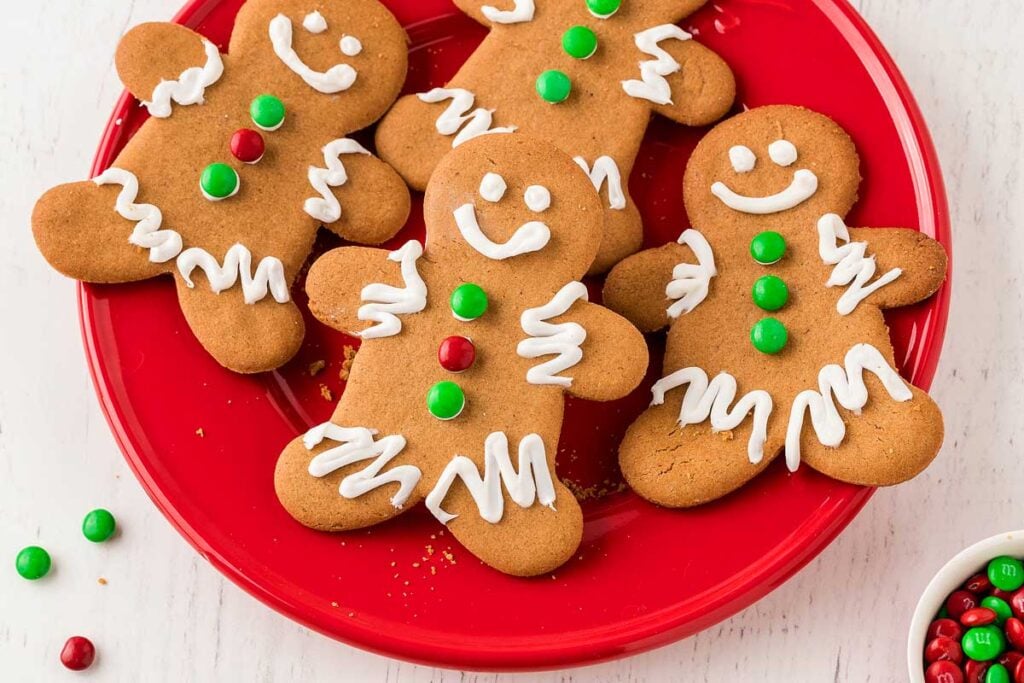 Easy gingerbread men on a red plate.