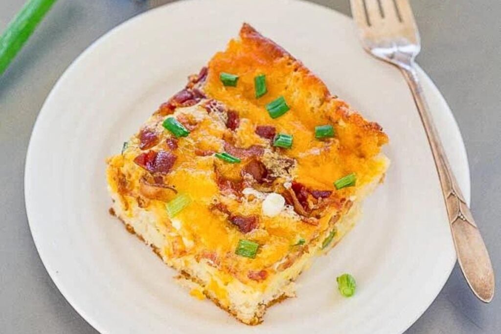 A casserole with cheesy bacon and eggs.