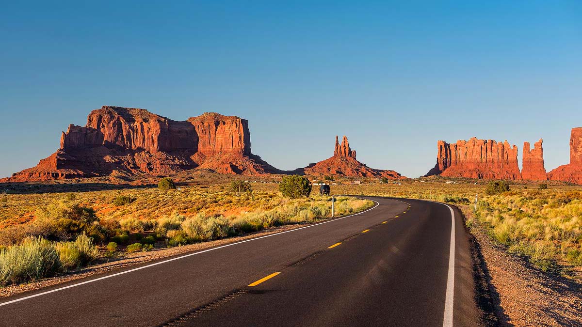 Empty scenic highway in Monument Valley, Arizona, USA.