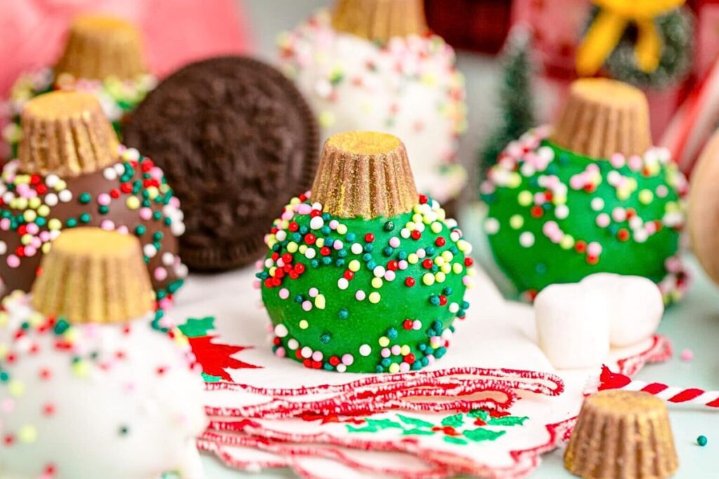 Oreo cookie balls decorated to look like Christmas ornaments.