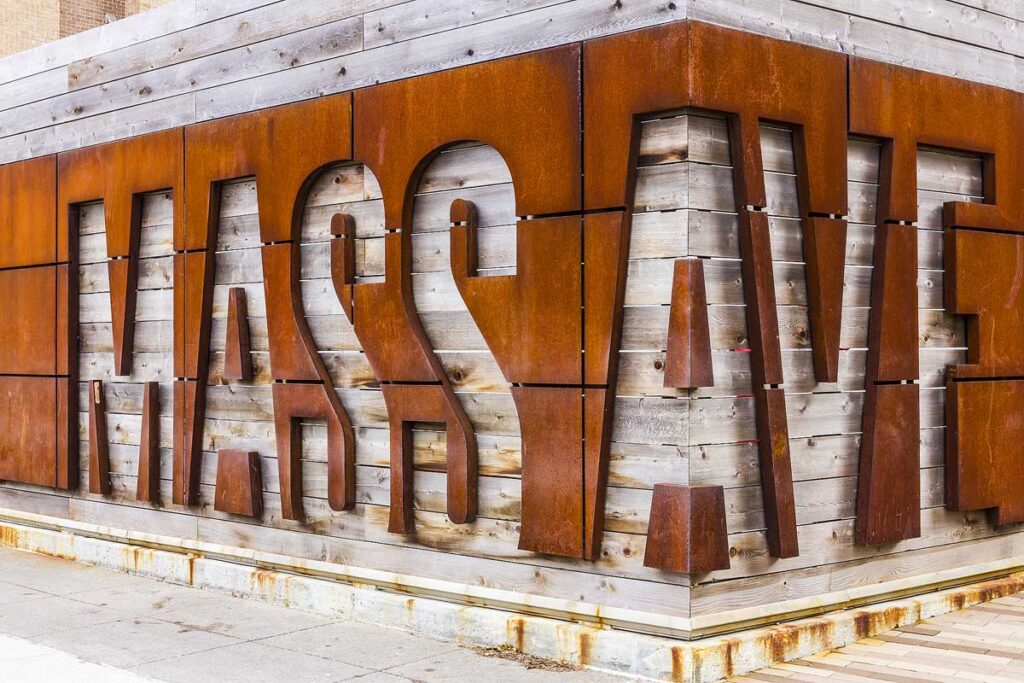 Street Sign for Massachusetts Avenue. Known Locally as Mass Ave, it is famous for its Arts, Food and Theaters.