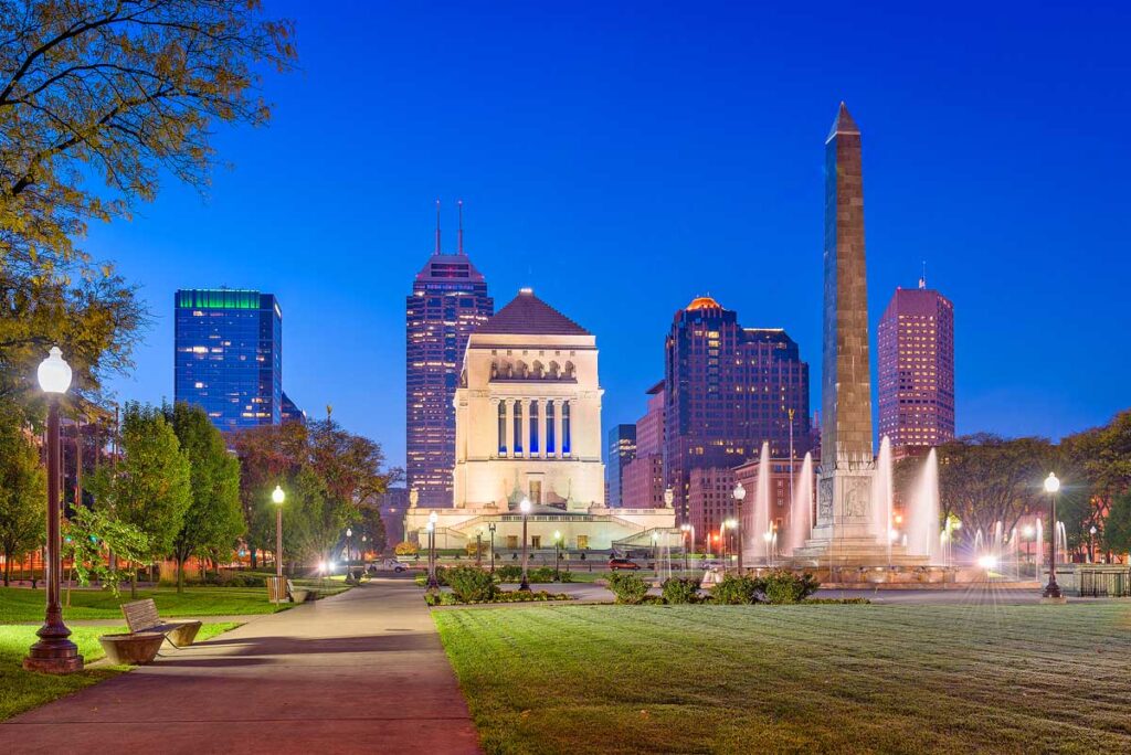 War memorials and skyline at twilight.