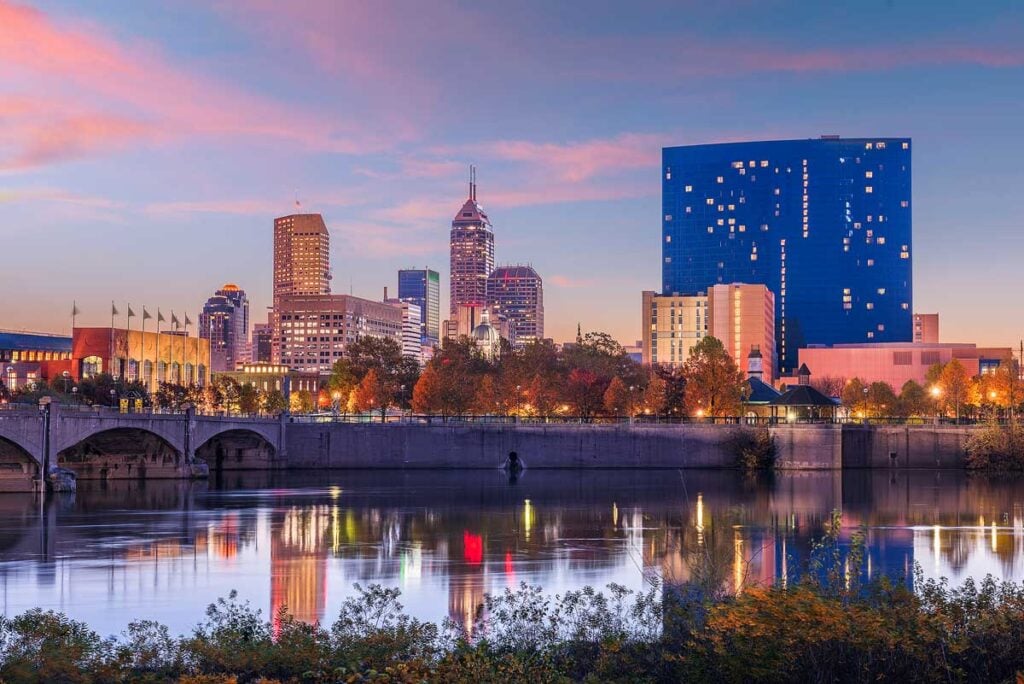 Indianapolis, Indiana, USA skyline on the White River at dusk.
