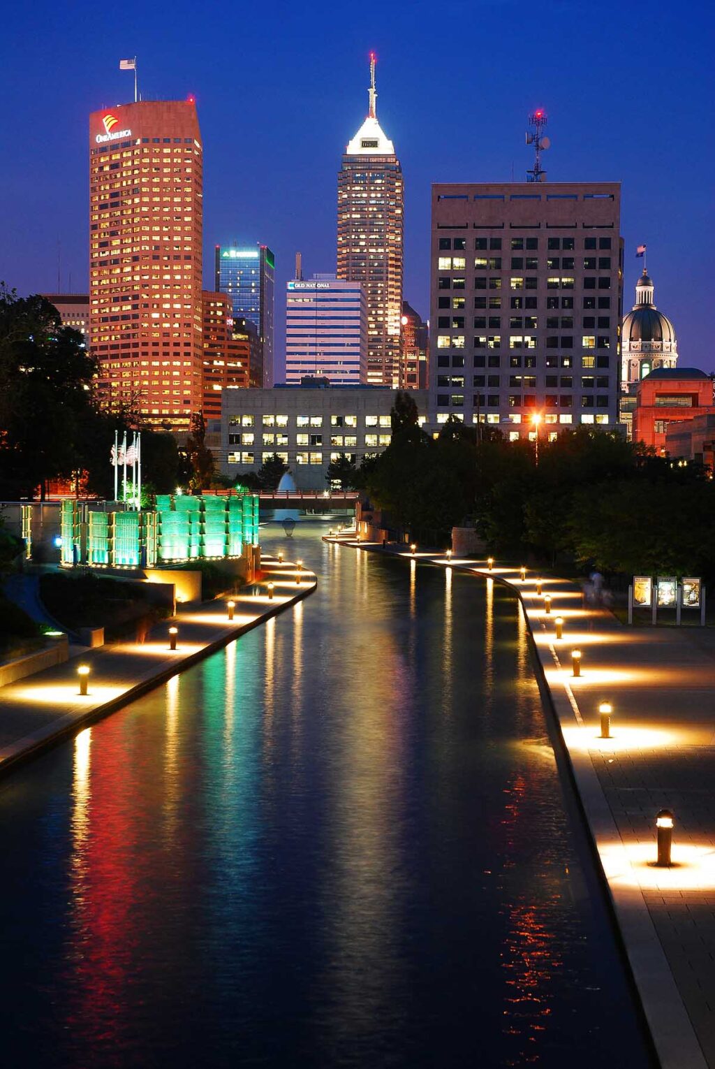 The skyline of Indianapolis, Indiana is reflected in the city's Canal Walk