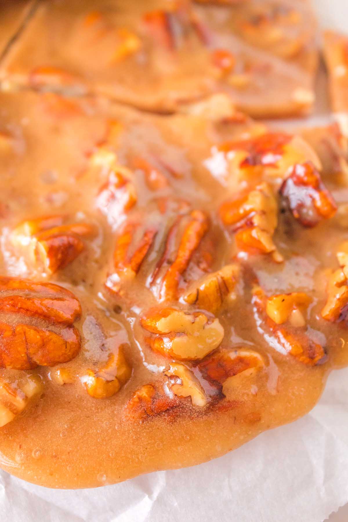 Nut brittle with caramel and pecans.