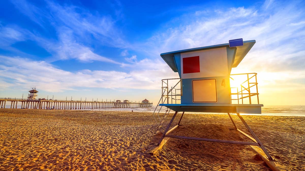 Rescue tower at huntington beach during sunset.