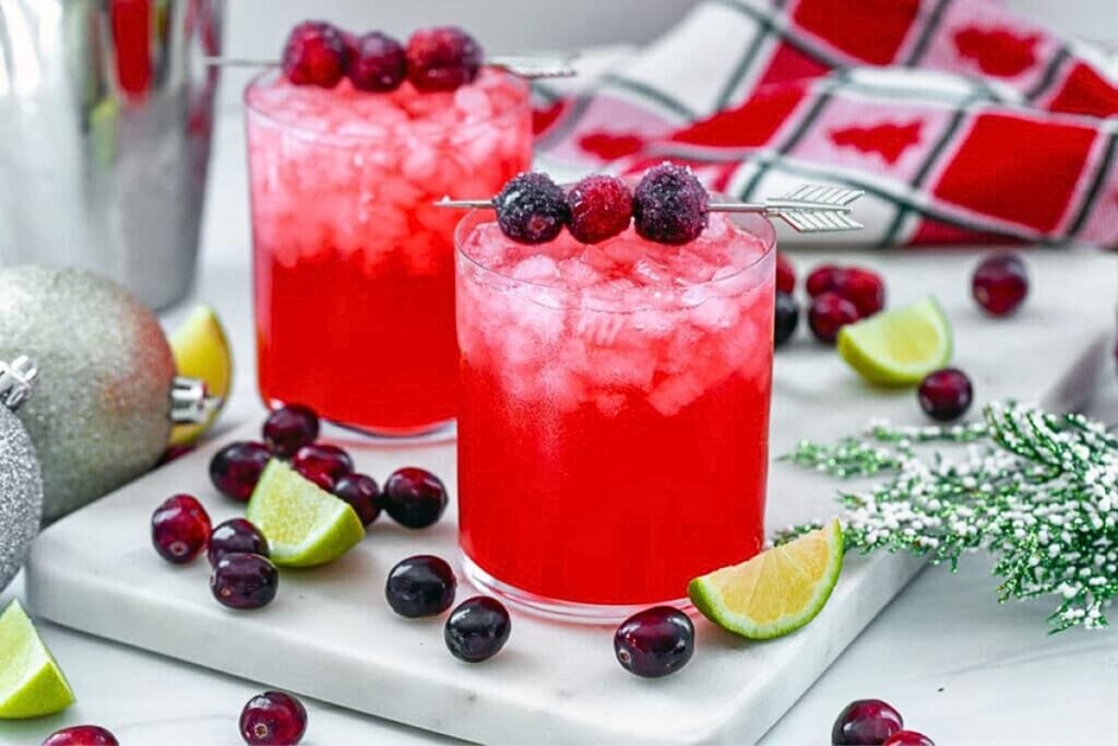 Cranberry gin cocktails with cranberry garnish.