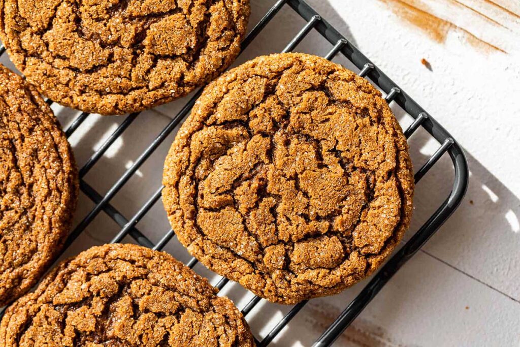 Gluten-free ginger cookies on a cooling rack.