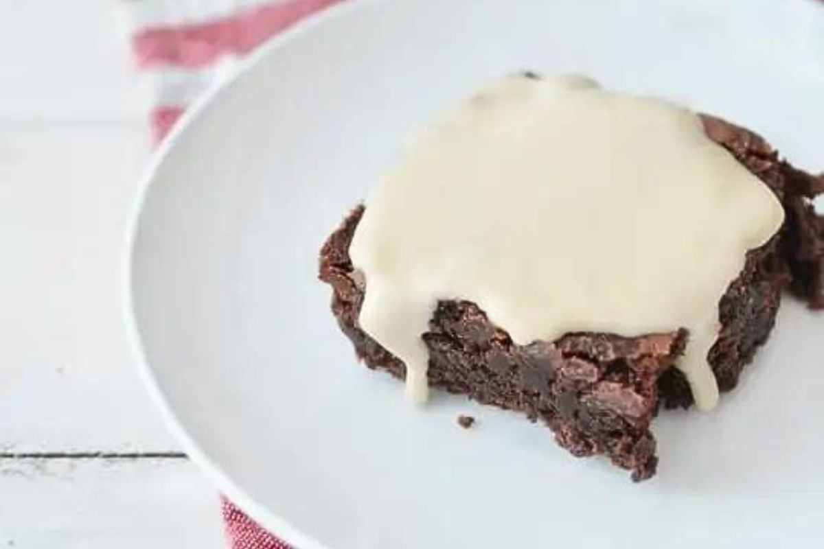 Molasses frosting on a gingerbread brownie.