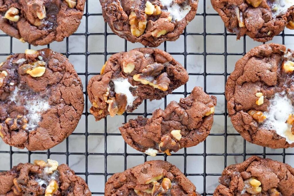 Round up your cravings with these nutty chocolate cookies, perfectly displayed on a cooling rack.