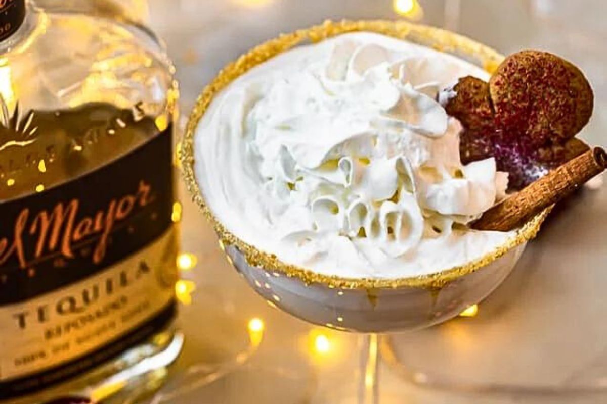 A gingerbread tequilla martini with a cookie garnish.