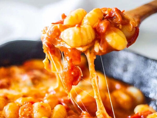 A baked cheesy gnocchi dish.