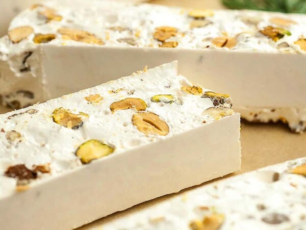 Slices of torrone candy nougat.