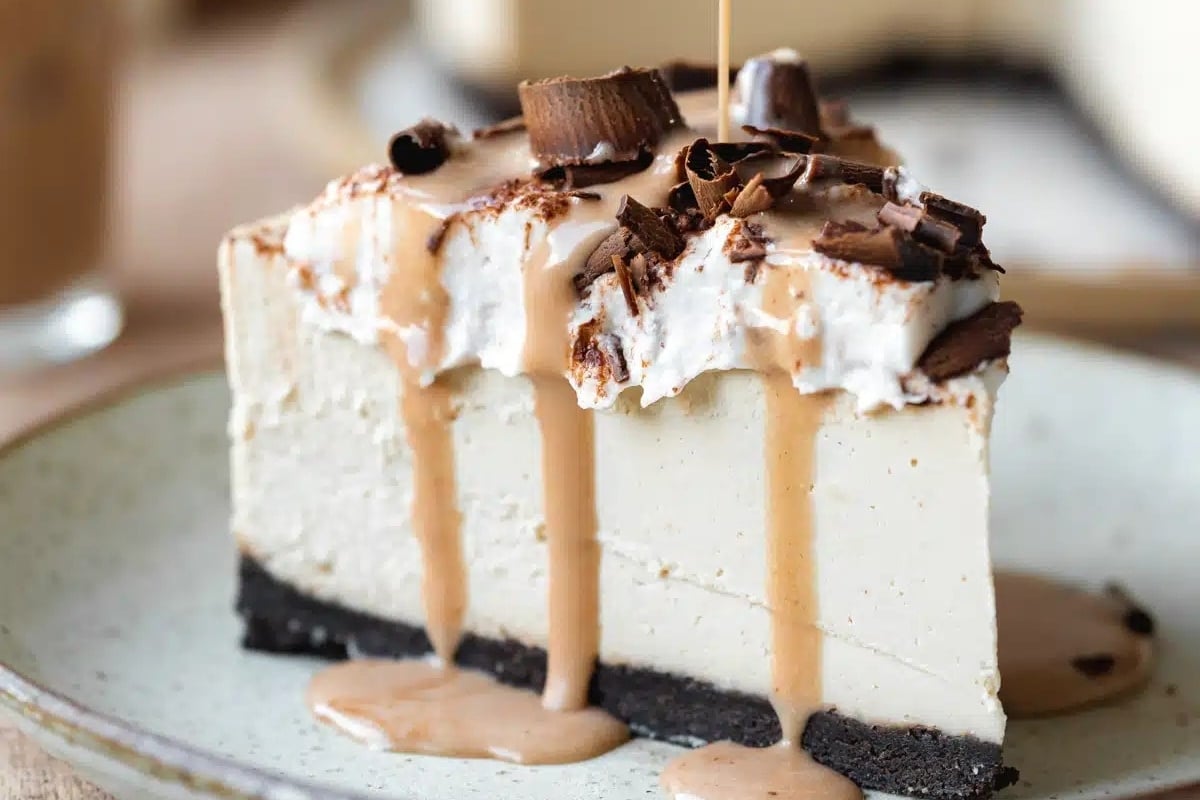 A holiday slice of peanut butter cheesecake on a plate.
