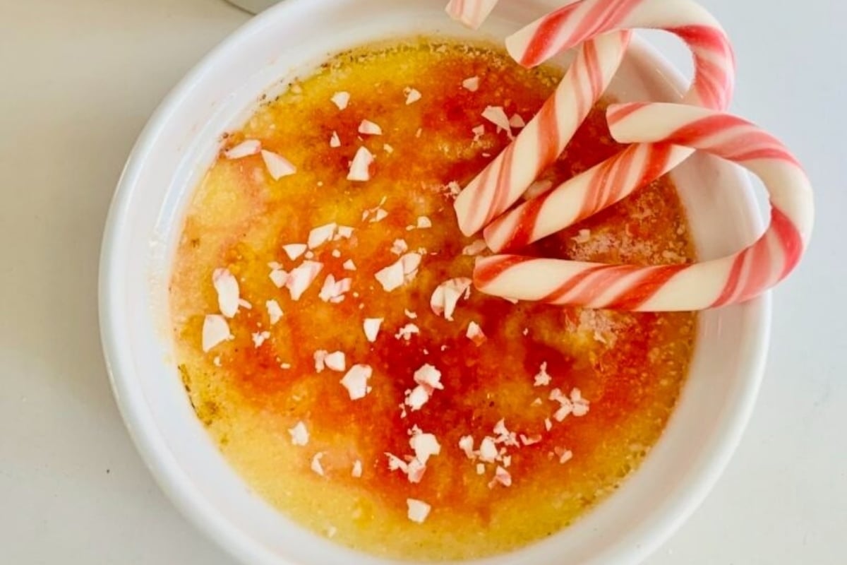 A festive bowl filled with candy canes.