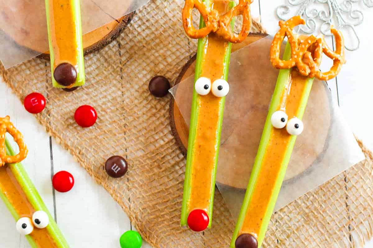 Reindeer celery snack sticks adorned with candy eyes.