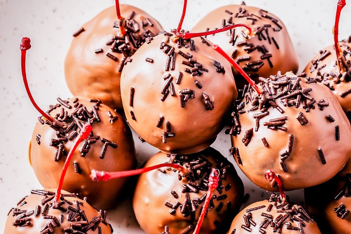 No bake Christmas desserts - Chocolate covered cherries on a plate.