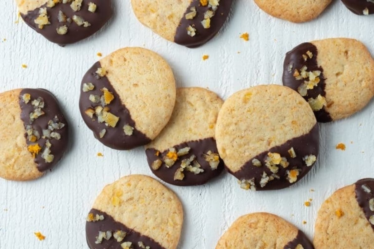 A collection of freezable cookies with chocolate on them.
