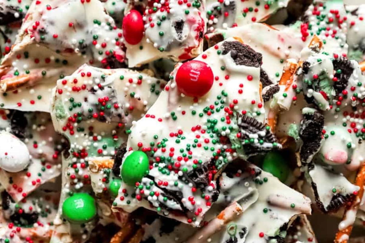 Christmas bark with sprinkles and candy canes.