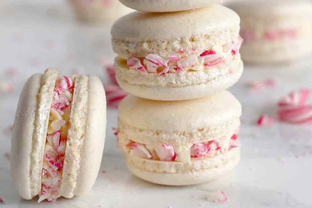 Peppermint macarons stacked on top of each other.