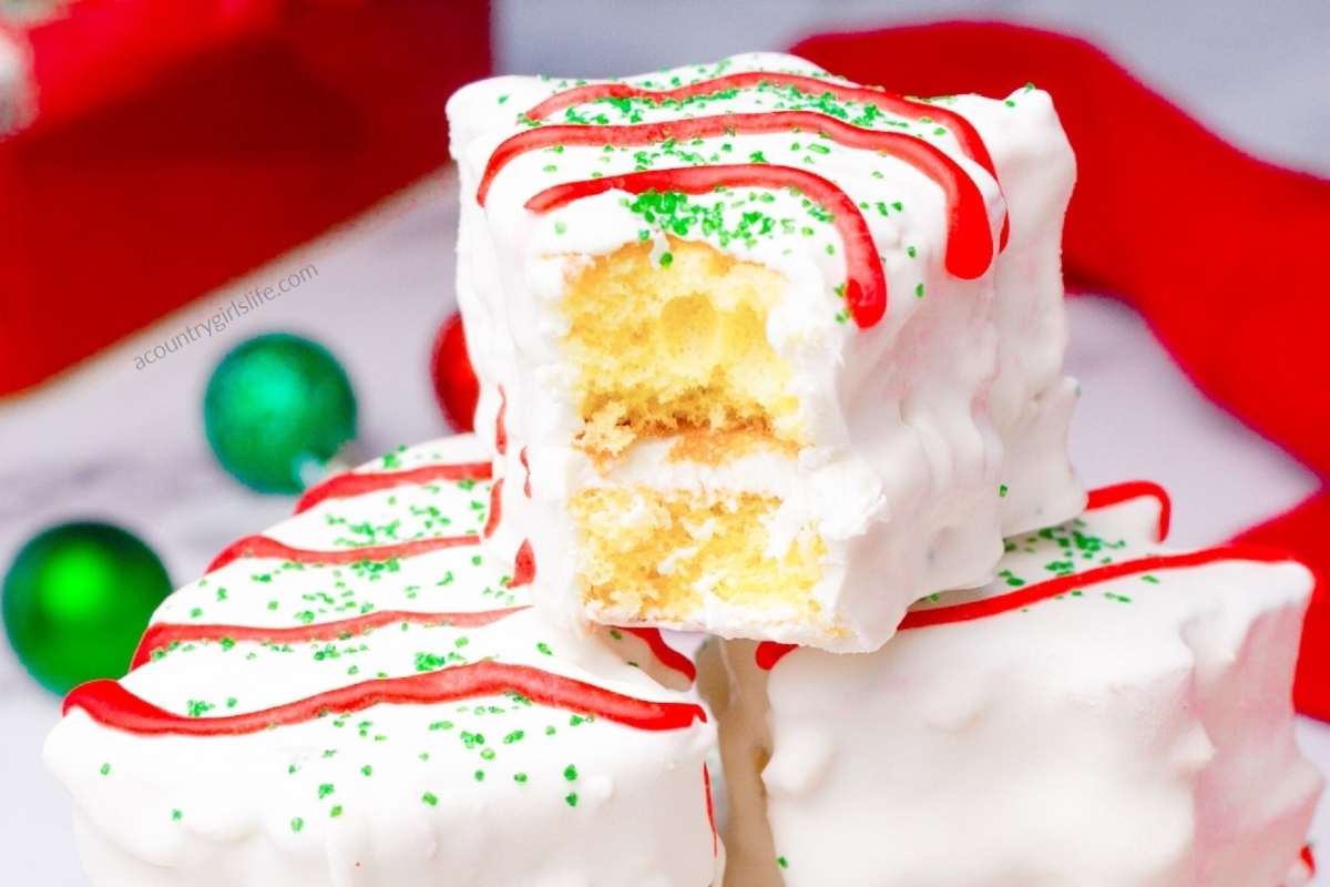 A stack of white chocolate marshmallows stacked on top of each other.