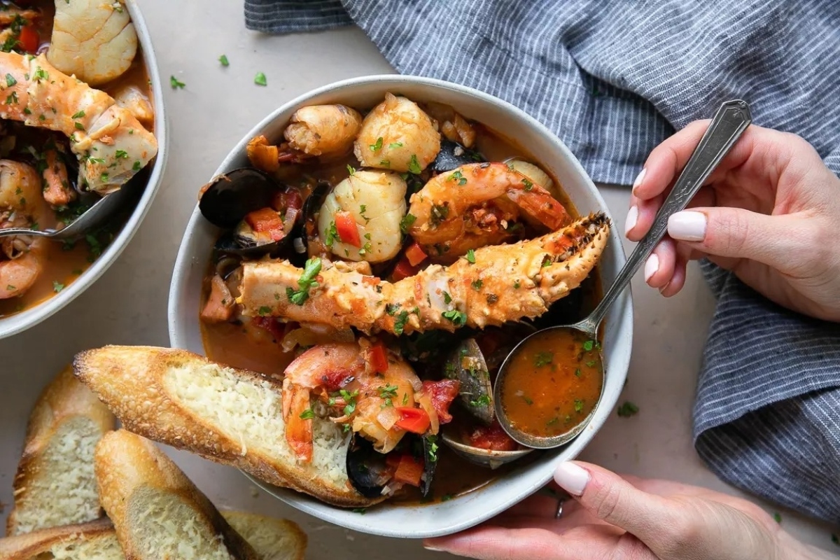 New Year's Eve feast: Two bowls of delectable seafood stew served with fresh bread.
