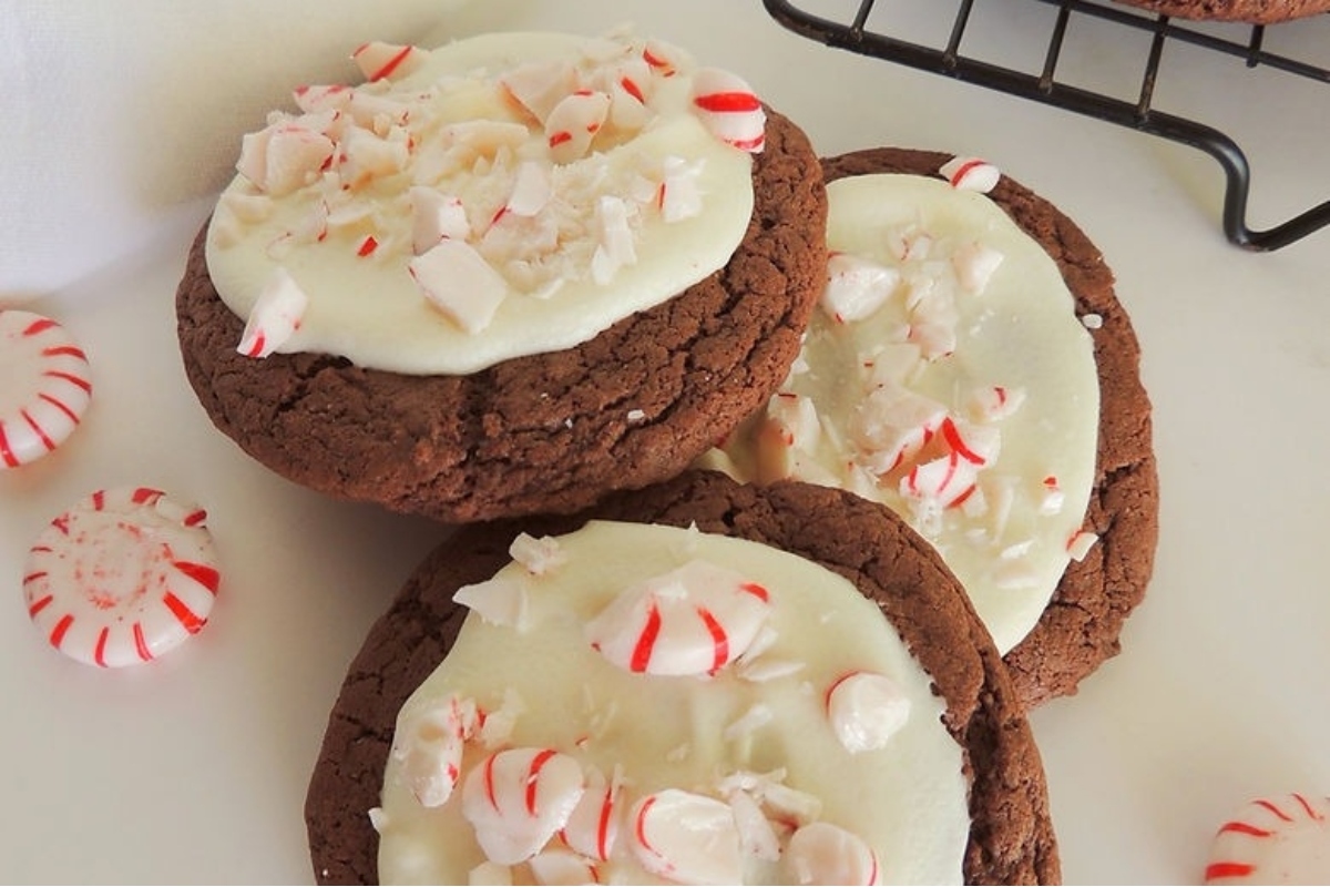 Peppermint cookies with white icing and candy canes.