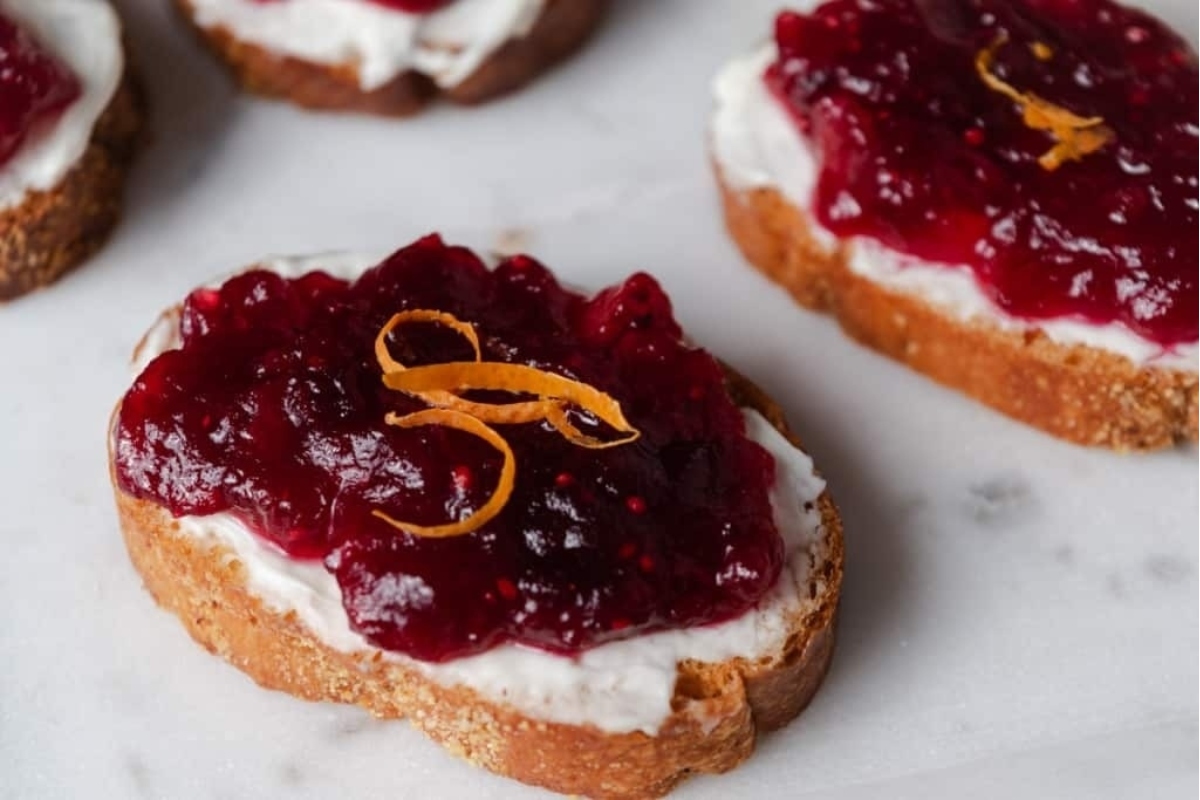 Cranberry and goat cheese toasts are the perfect addition to your New Year's eve party.